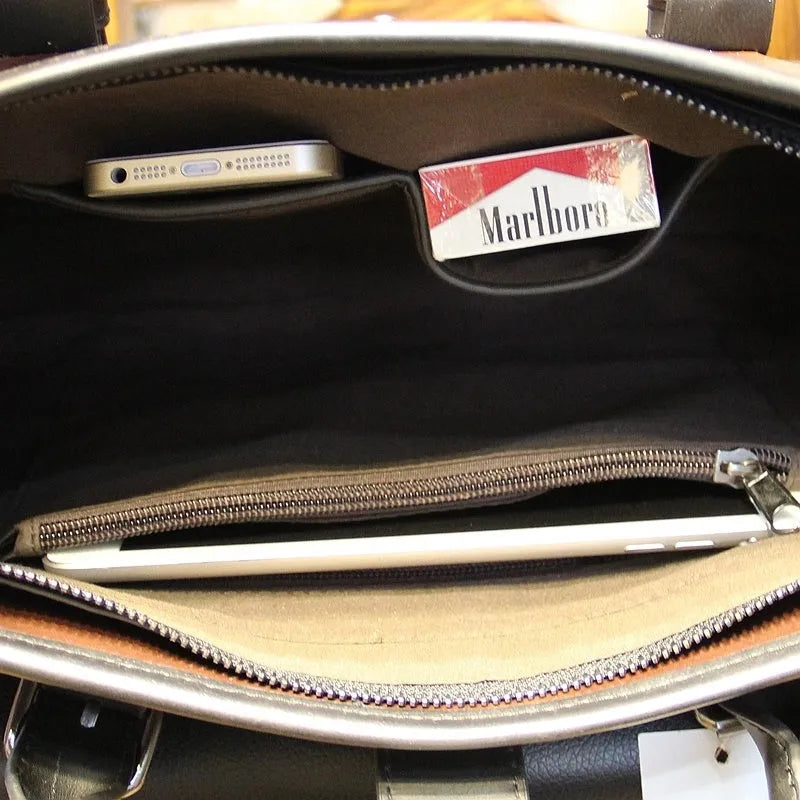 Men's cowhide leather handbag in black, horizontal square shape, medium size, with zipper closure and hard handle