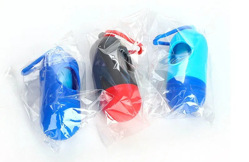 Roll of 22.5x30cm dog waste bags in assorted colours on a green background.
