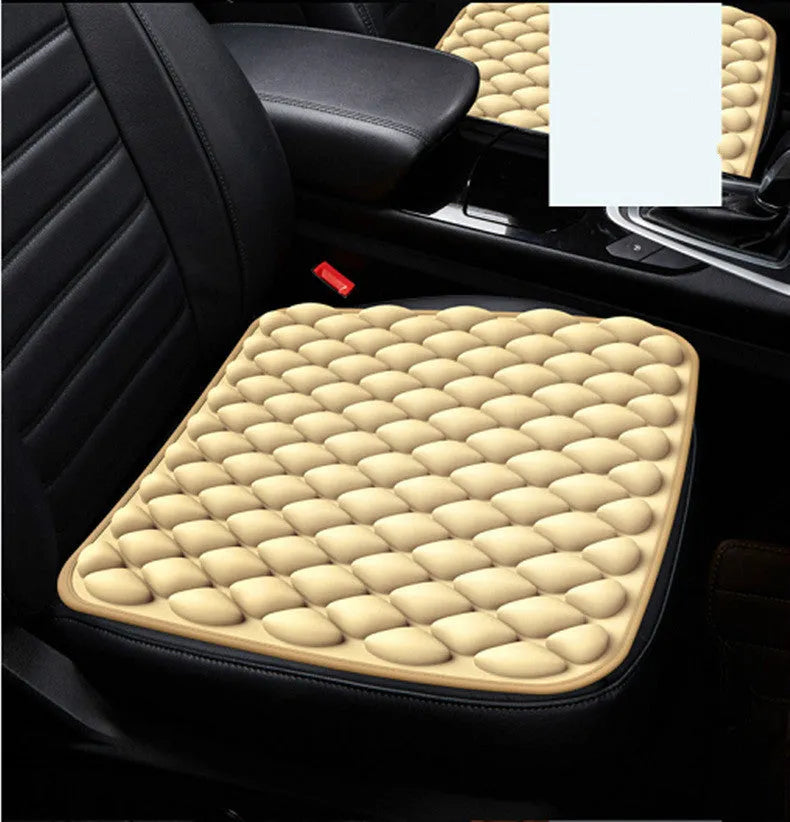 The Pressure Relief Seat Breathes polyester fiber cushion 45x45cm in beige on a chair