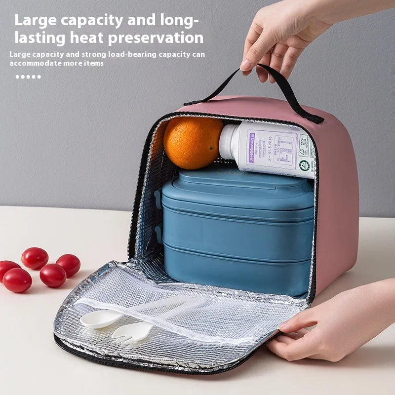 Insulated lunch bag in textured cloth material with bento handbag style and modern minimalist design