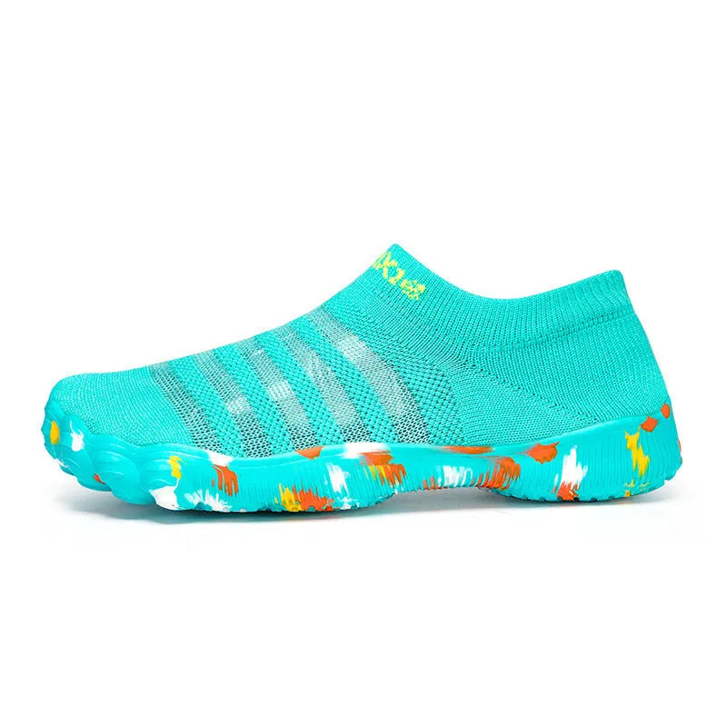 Flyknit water shoes in camouflage colour with flat rubber sole and lace-up front.