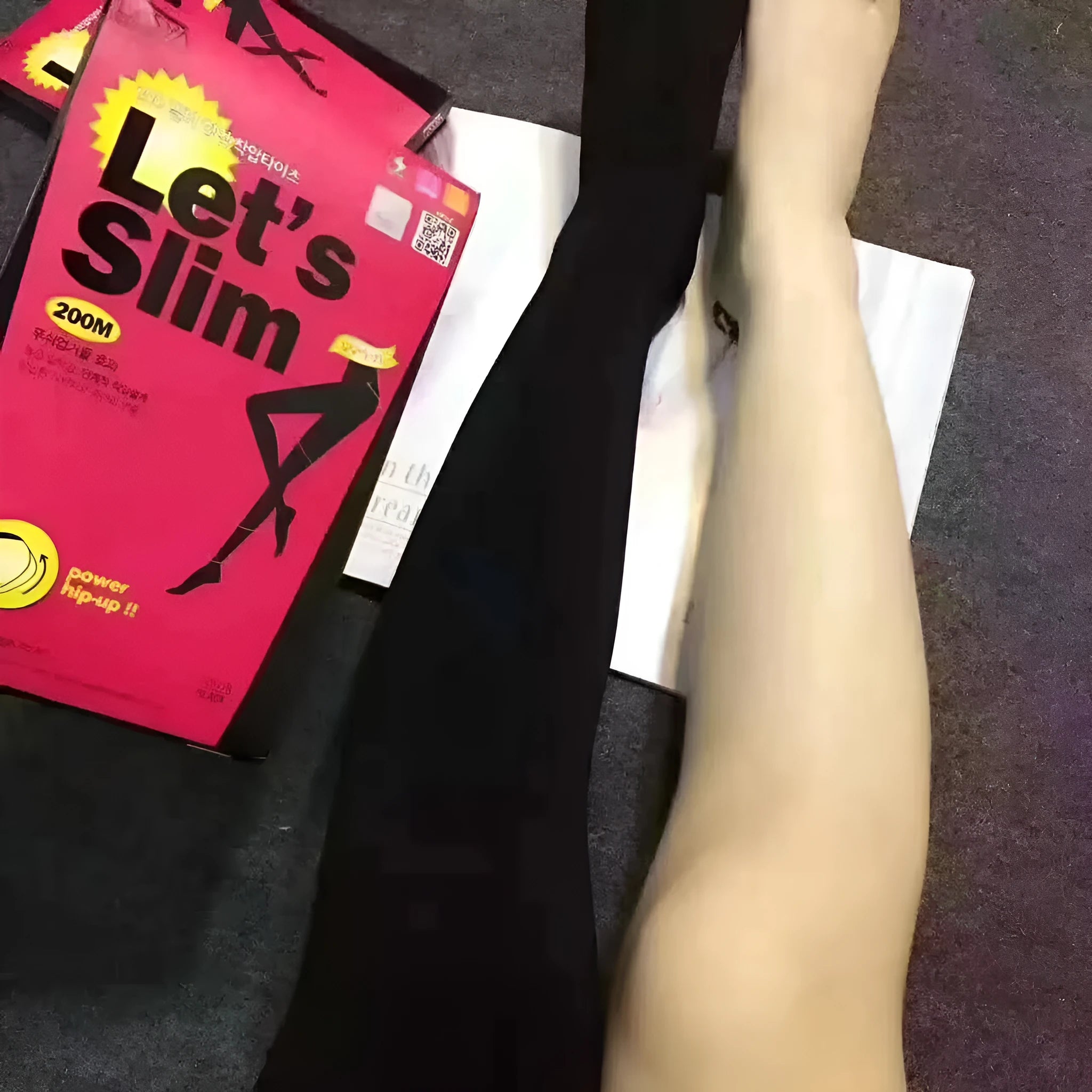 Beige and black stovepipe socks for hip and abdomen support, made from polyester fibre.