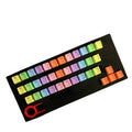 37-key PBT word-through keycap set with blue, green, orange, pink, purple, and yellow arrow options