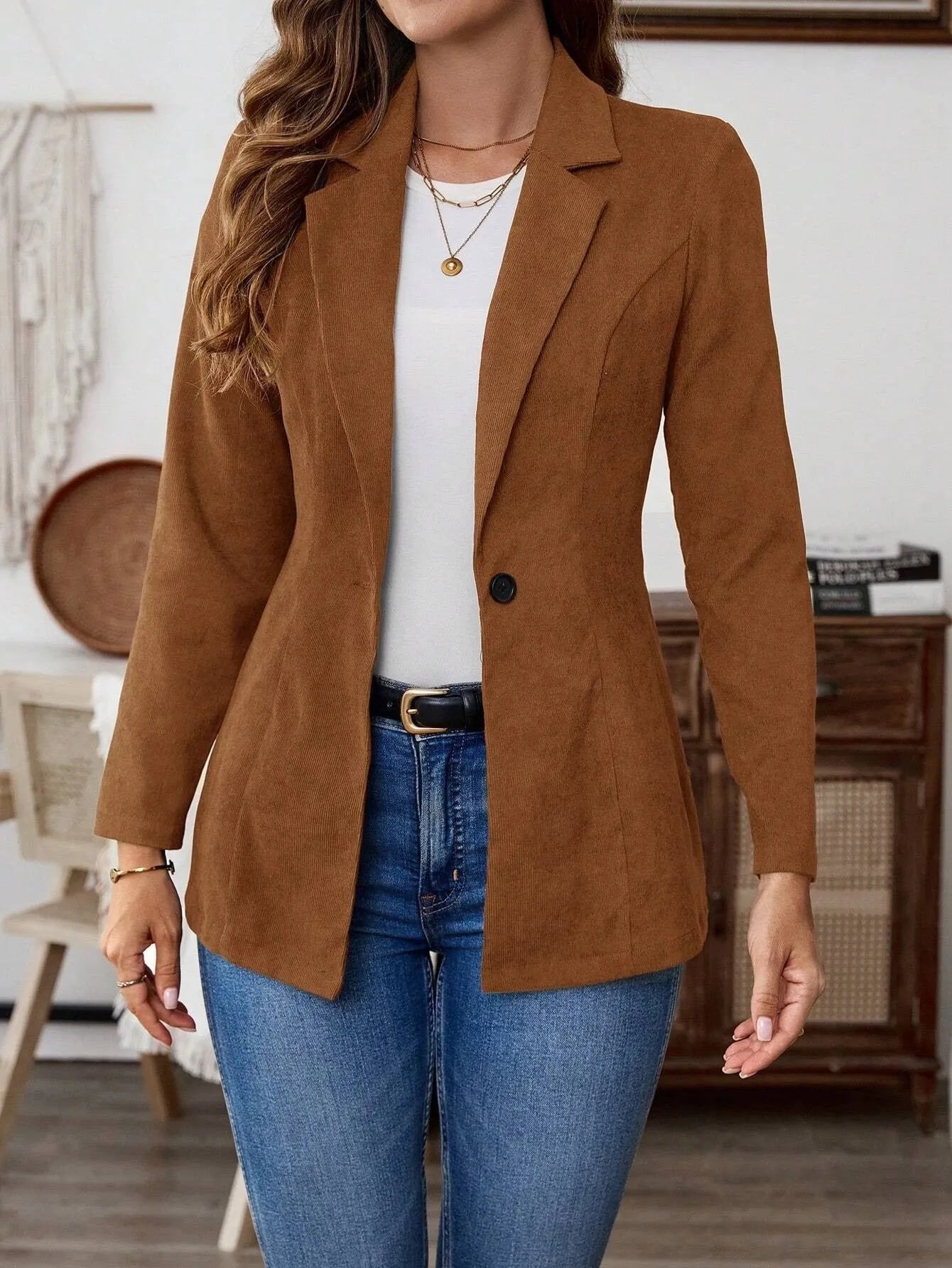 Brown men's long sleeve single-breasted suit coat with a lapel collar.