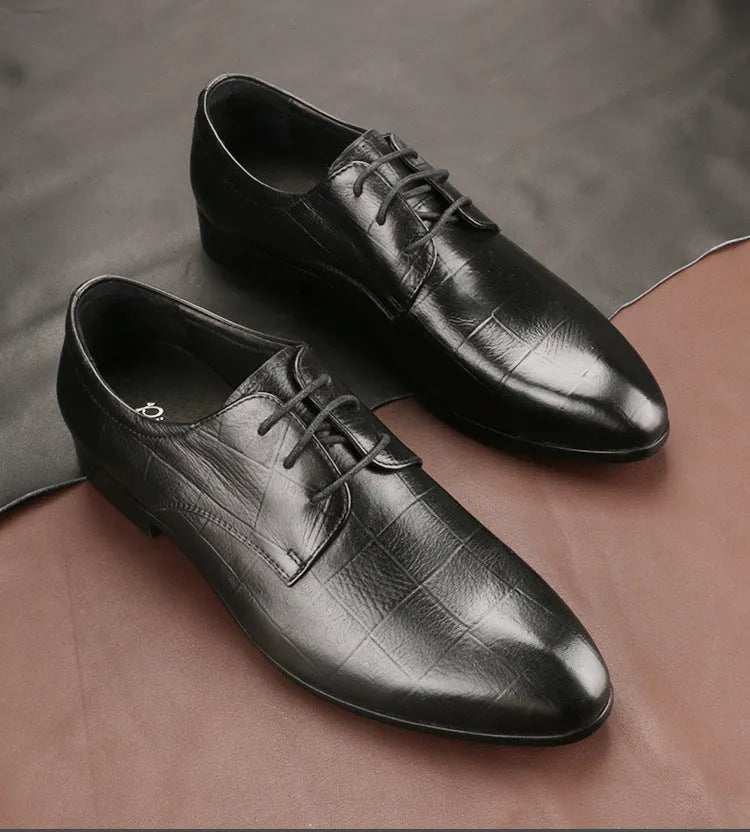 Men's black checkered derby leather shoes with a pointed toe and rubber sole.