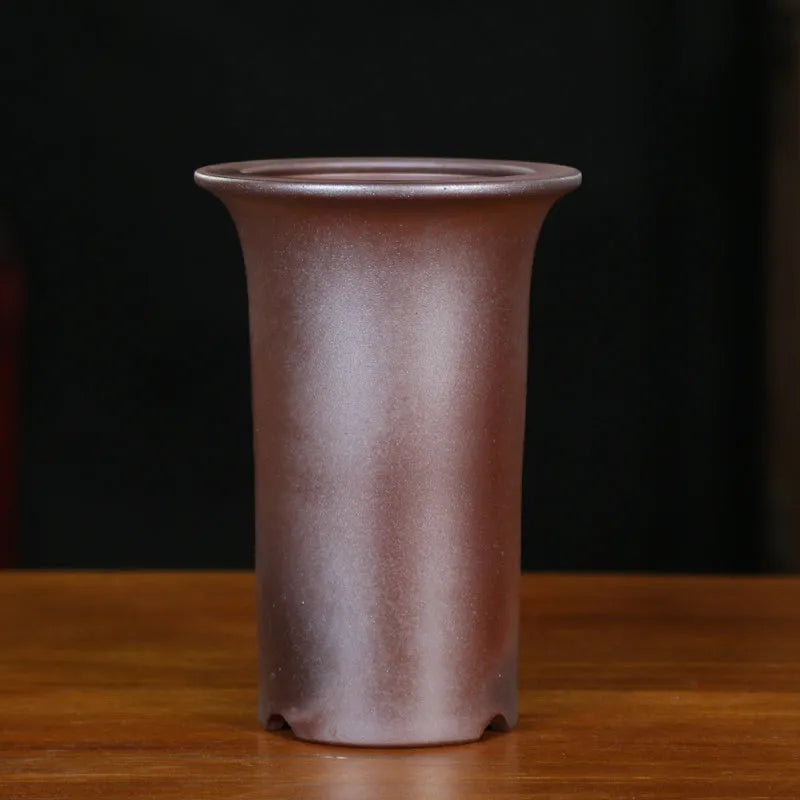 Round carved purple sand ceramic orchid pot with black firewood flat mouth for desktop or ground use