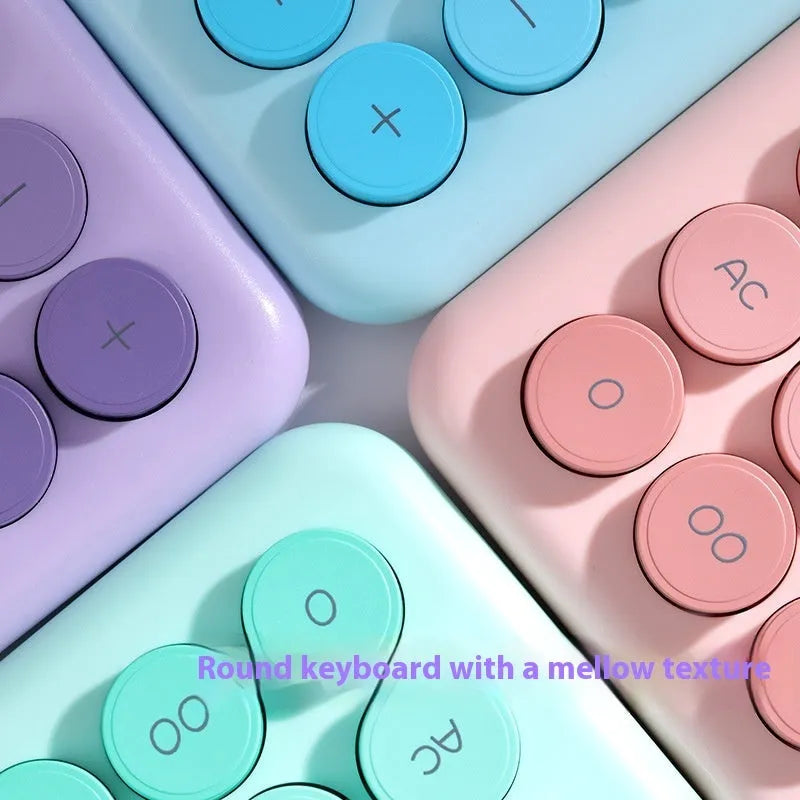 Gradient colour desk calculator in violet, cherry blossom pink, light blue or mint green.