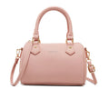 Ladies pillow crossbody bag in PU with zip closure and letter detail, shown in available colours.