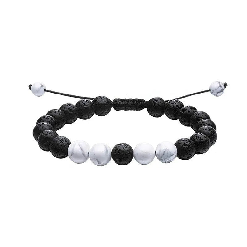 Geometric matte black agate couple bracelets for matching wear.