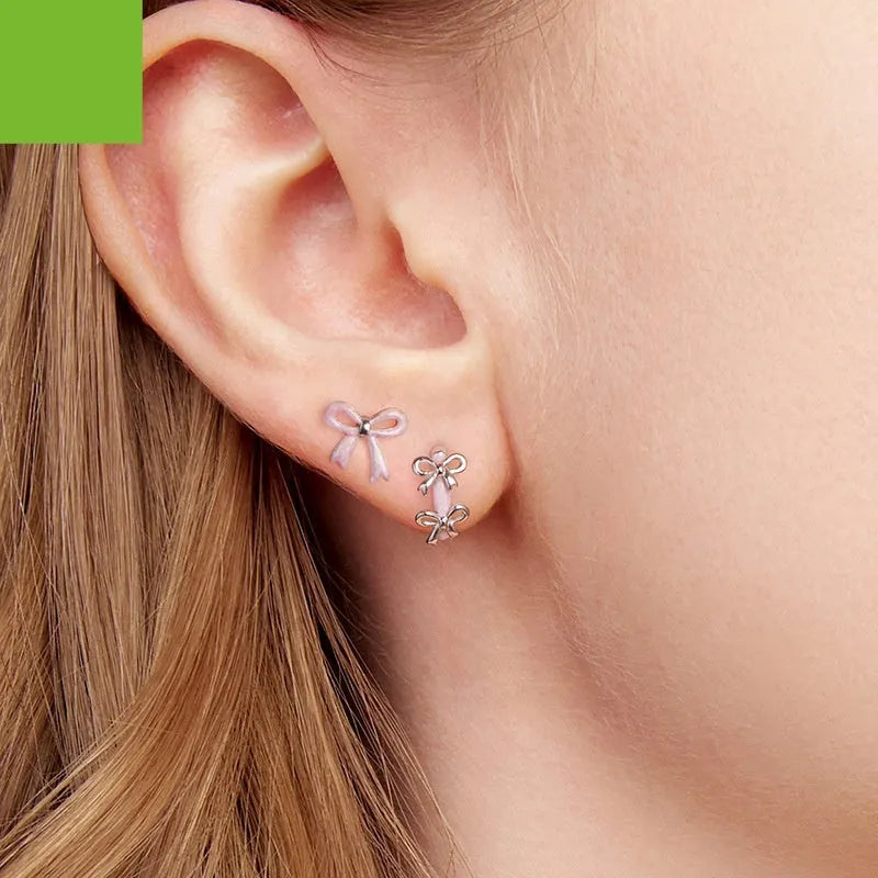 S925 sterling silver romantic bow ear clip with dripping oil finish in colour SCE1926