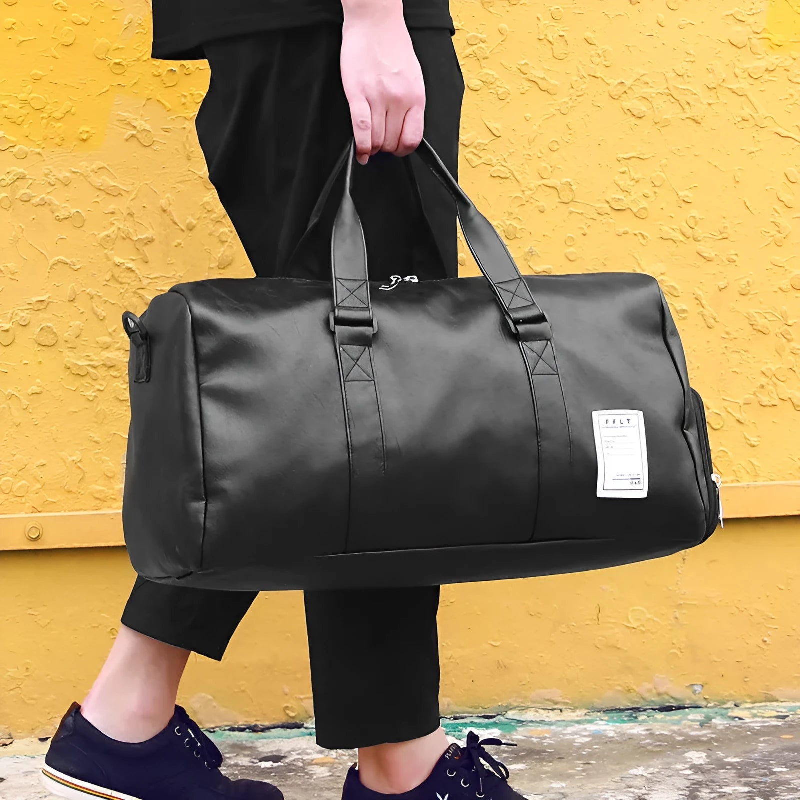 Black waterproof sports fitness bag with separate shoe compartment and diagonal shoulder strap.