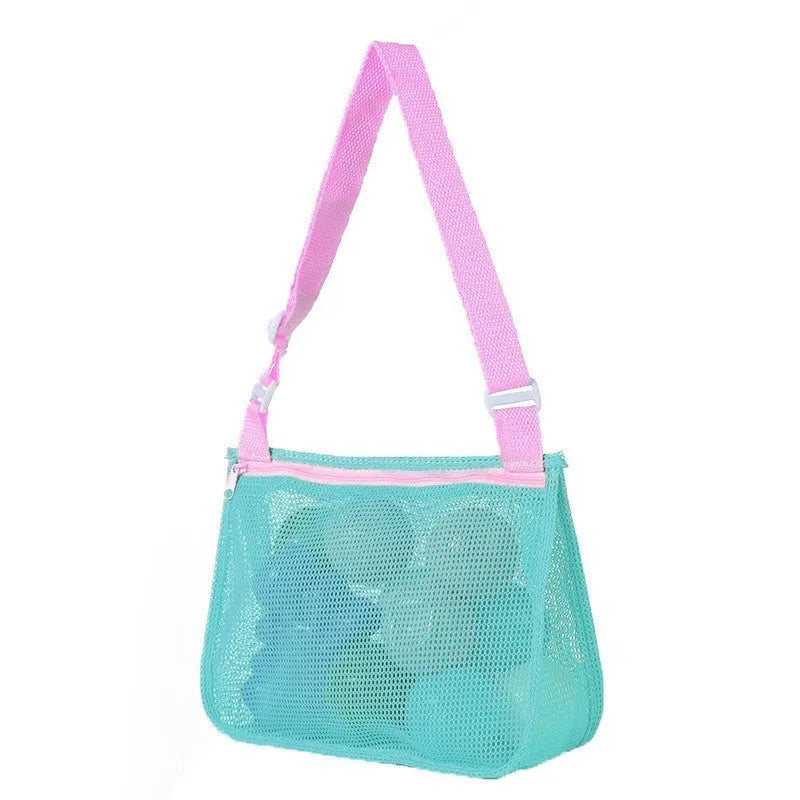 Blue nylon mesh travel storage bag with black handle and zip seal for children's clothing organisation