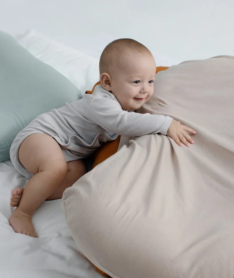 Beige portable cotton baby nest crib for infants measuring 75cm by 45cm