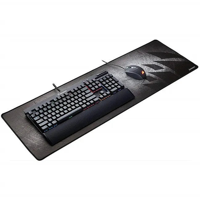 Black thickened non-slip mouse pad with rubber base and cloth surface on a desk