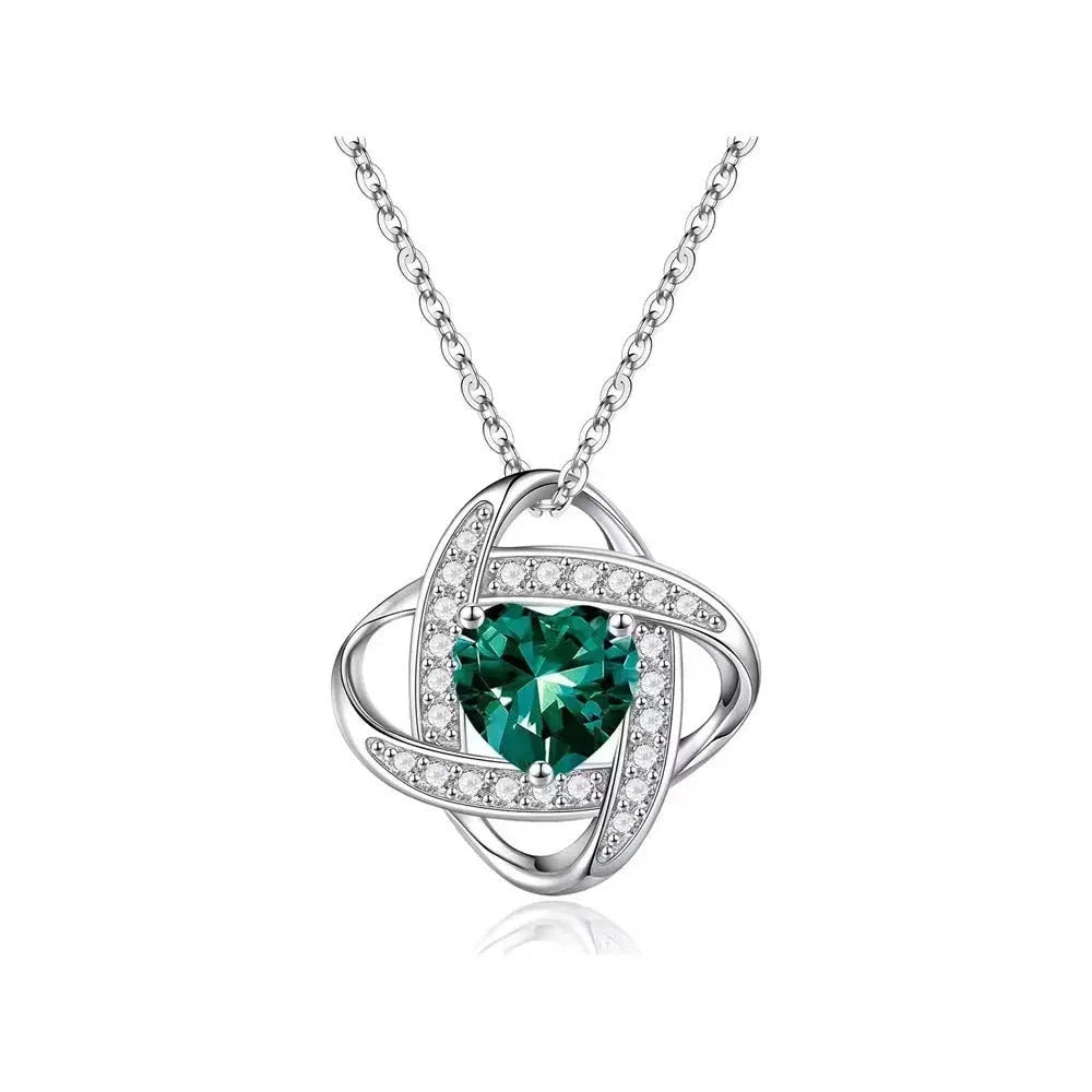 Copper heart necklace with electroplated finish in platinum diamond colours on model