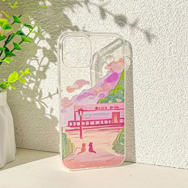 Soft silicone iPhone case with a two cat cartoon design on the back.