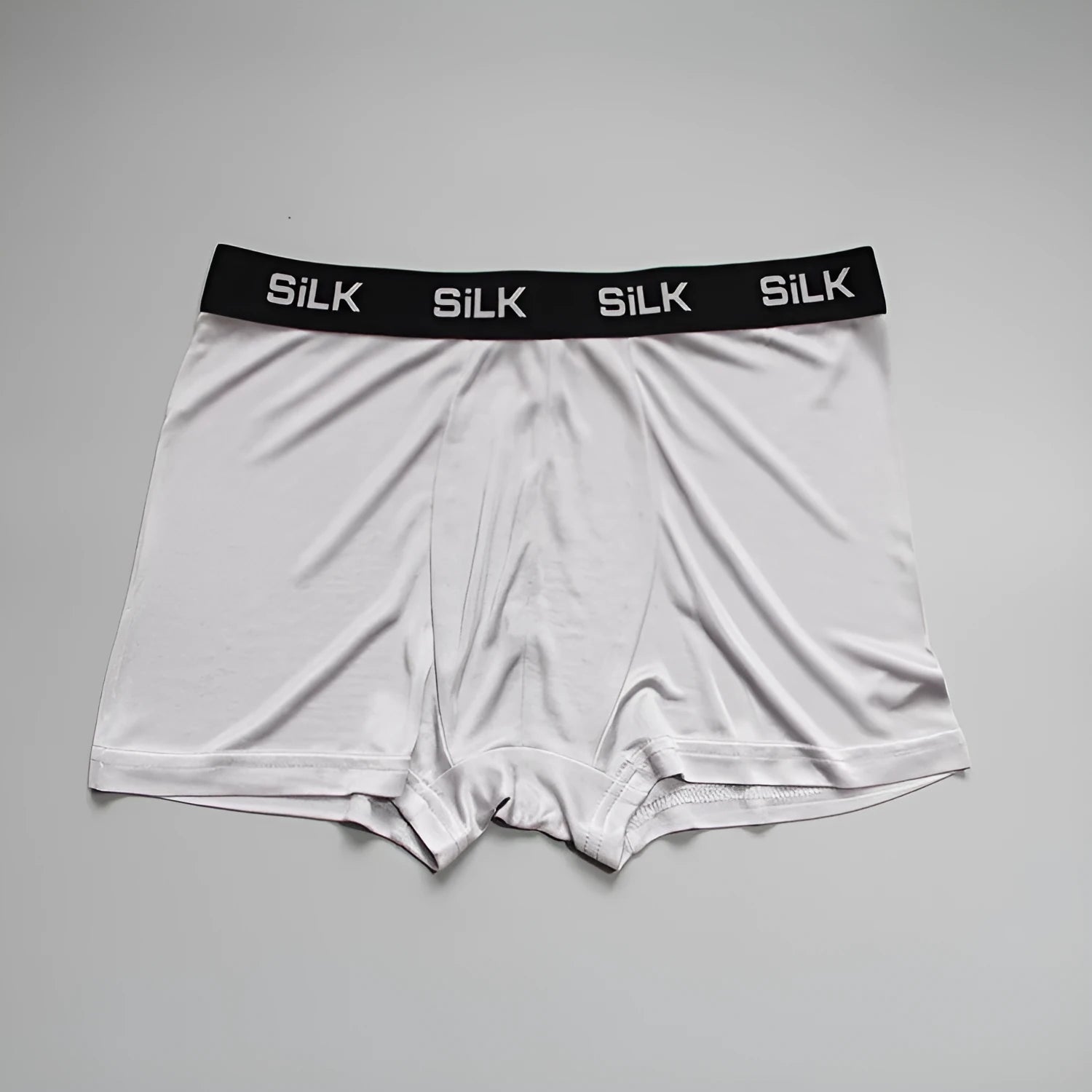Men's loose fit silk shorts in navy blue, silver grey, or skin colour with mid-waist design