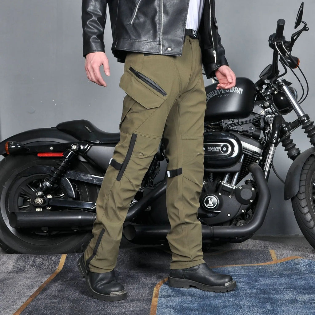 Men's black and green waterproof motorcycle cycling trousers with belt and protective gear.