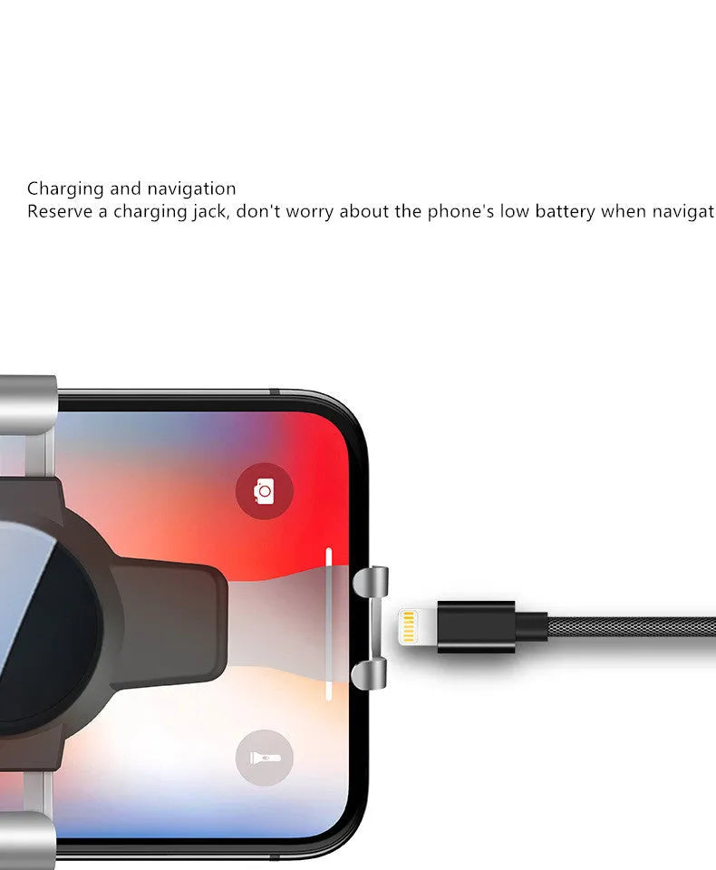 Black ABS car phone bracket mounted on vehicle air conditioning port holding smartphone