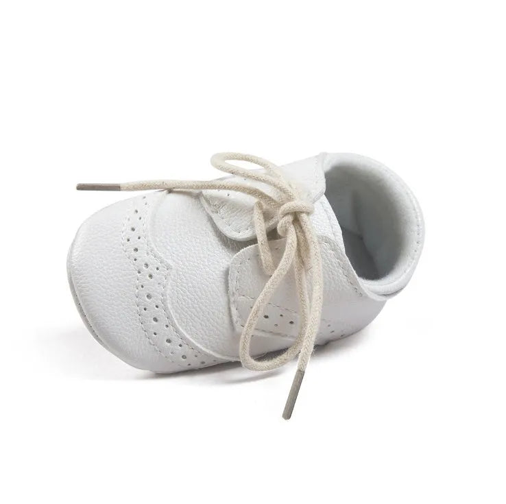Men's vintage-style baby walking shoes in synthetic leather, shown in light brown colour.