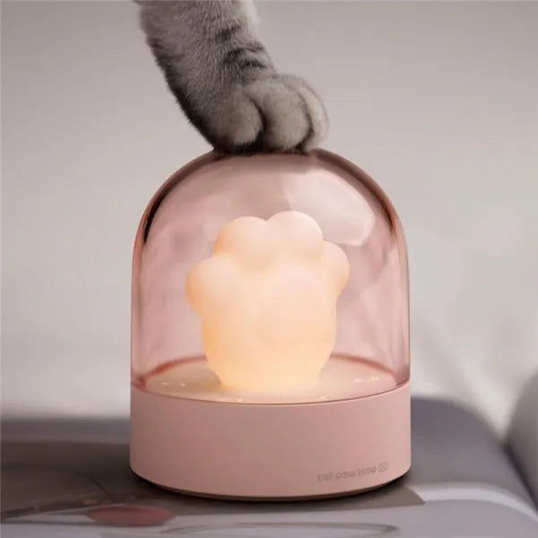Grey and pink cat paw shaped USB rechargeable musical night light with adjustable brightness