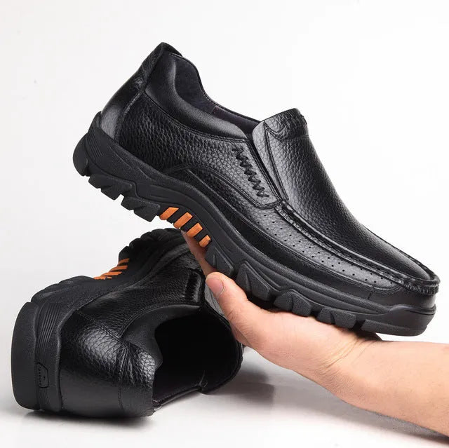Men's black leather slip-on business casual shoes with a rubber sole, shown on a neutral background.