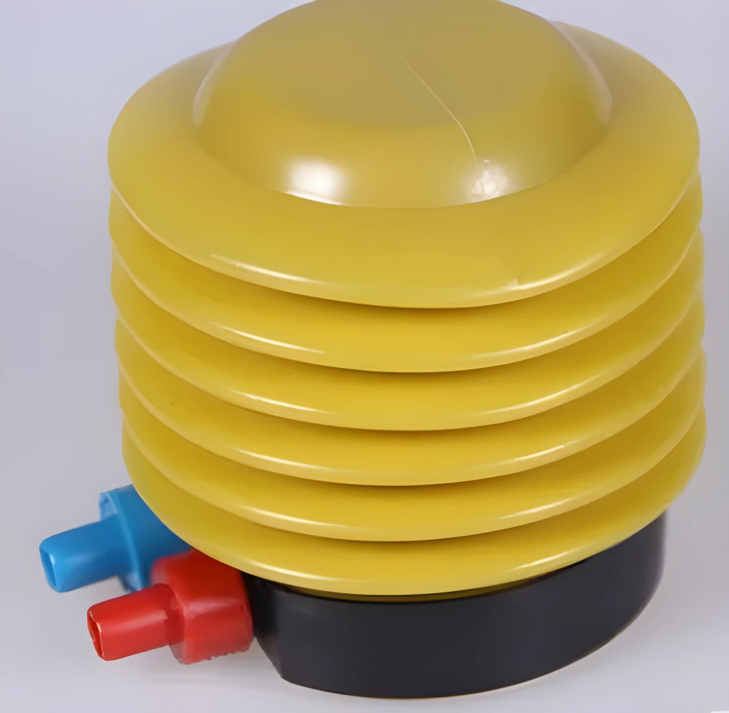 Blue and red plastic pedal pump inflator for swim rings with 4-inch diameter