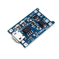 Small blue lithium battery charging and protection circuit board measuring 2.6 by 1.7 centimetres