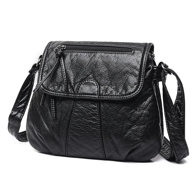 REPRCLA women's black crossbody messenger bag in soft PU leather, 25cm x 22cm x 3cm, two-layer design