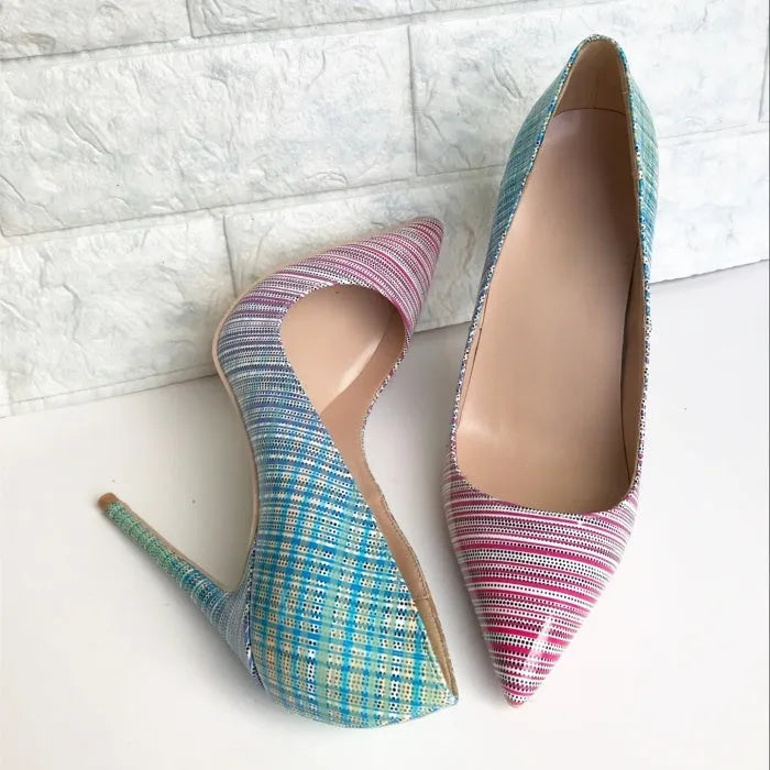 Ladies pink and blue gradient patent leather pointed toe high heels on a rubber sole.