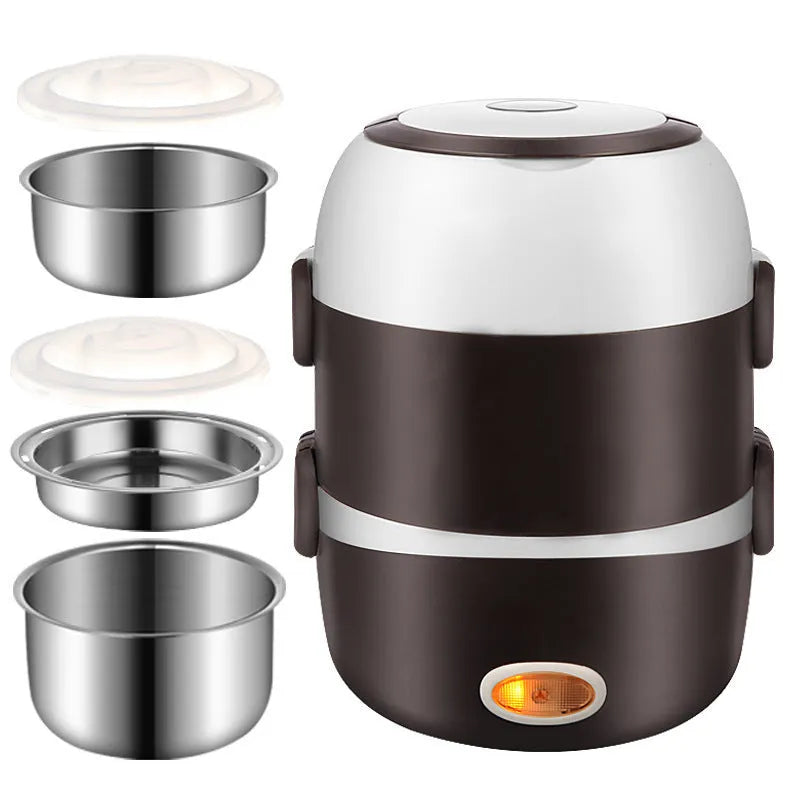 White electric lunch box with USB cable plugged in, showing two-layer food compartments