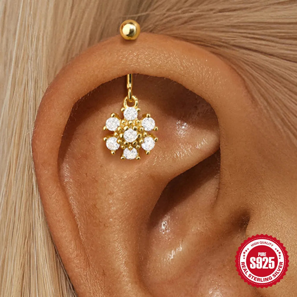 S925 sterling silver snowflake horse eye diamond ball flat back earrings in gold geometric shape on white background