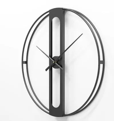Round metal wall clock with 50cm diameter in black or gold finish on a wall