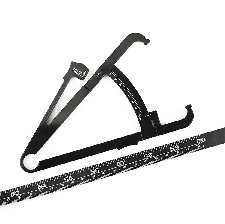 Black ABS body fat caliper instrument with measurement scale and pinching mechanism.