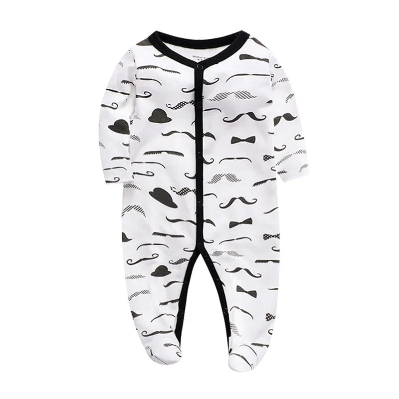 Soft cotton baby one-piece bodysuit in blue and green dinosaur print, size 6M, front view on white background