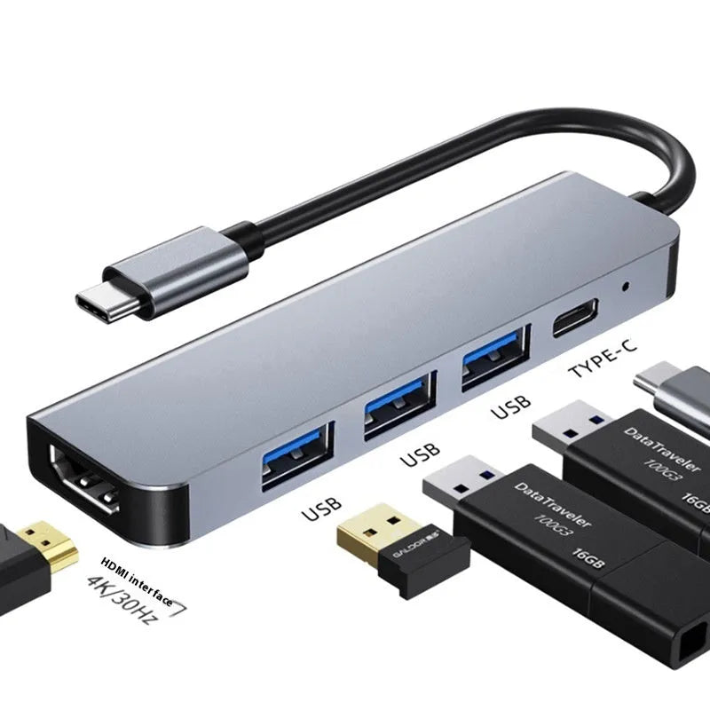 USB-C 7-in-1 expansion dock with HDMI port, multiple USB ports, and a 15cm black cable.