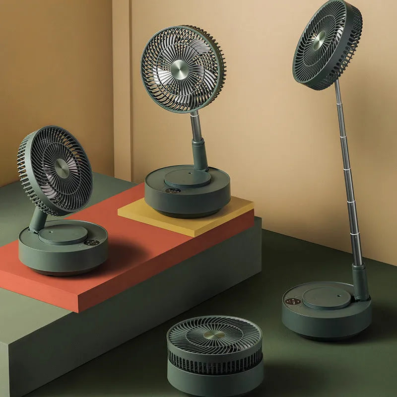 Green telescopic floor fan extended to full height with magnetic remote control attached