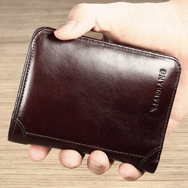 Open view of a black men's leather bifold wallet showing card slots, photo window, and zipped coin pocket.