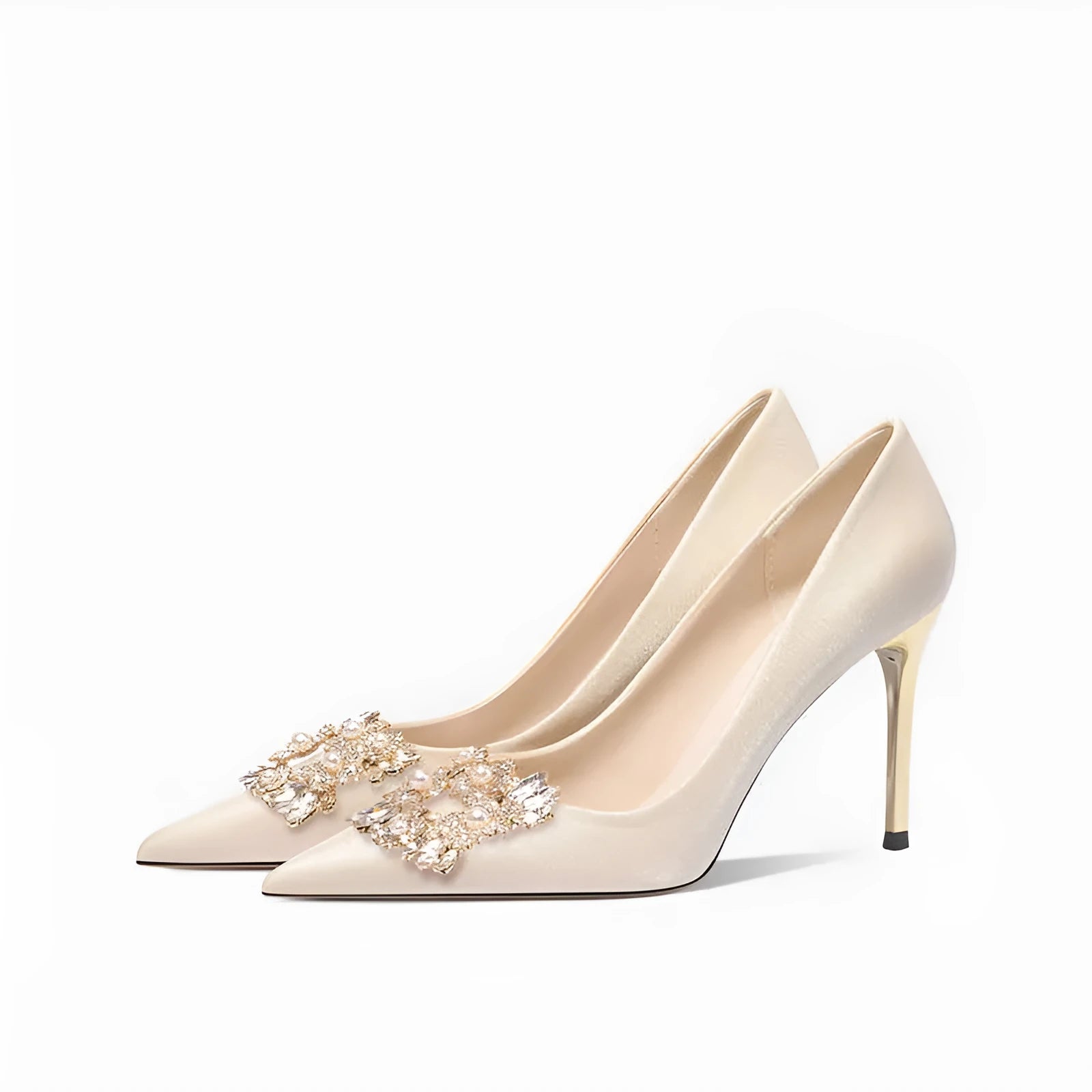 Rhinestone-decorated pointed-toe bridal high heels with a stiletto heel on a white background.