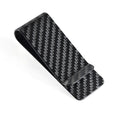 Black carbon fiber money clip with glossy striped surface, 7.1cm high, 2.8cm long, 1.3cm wide
