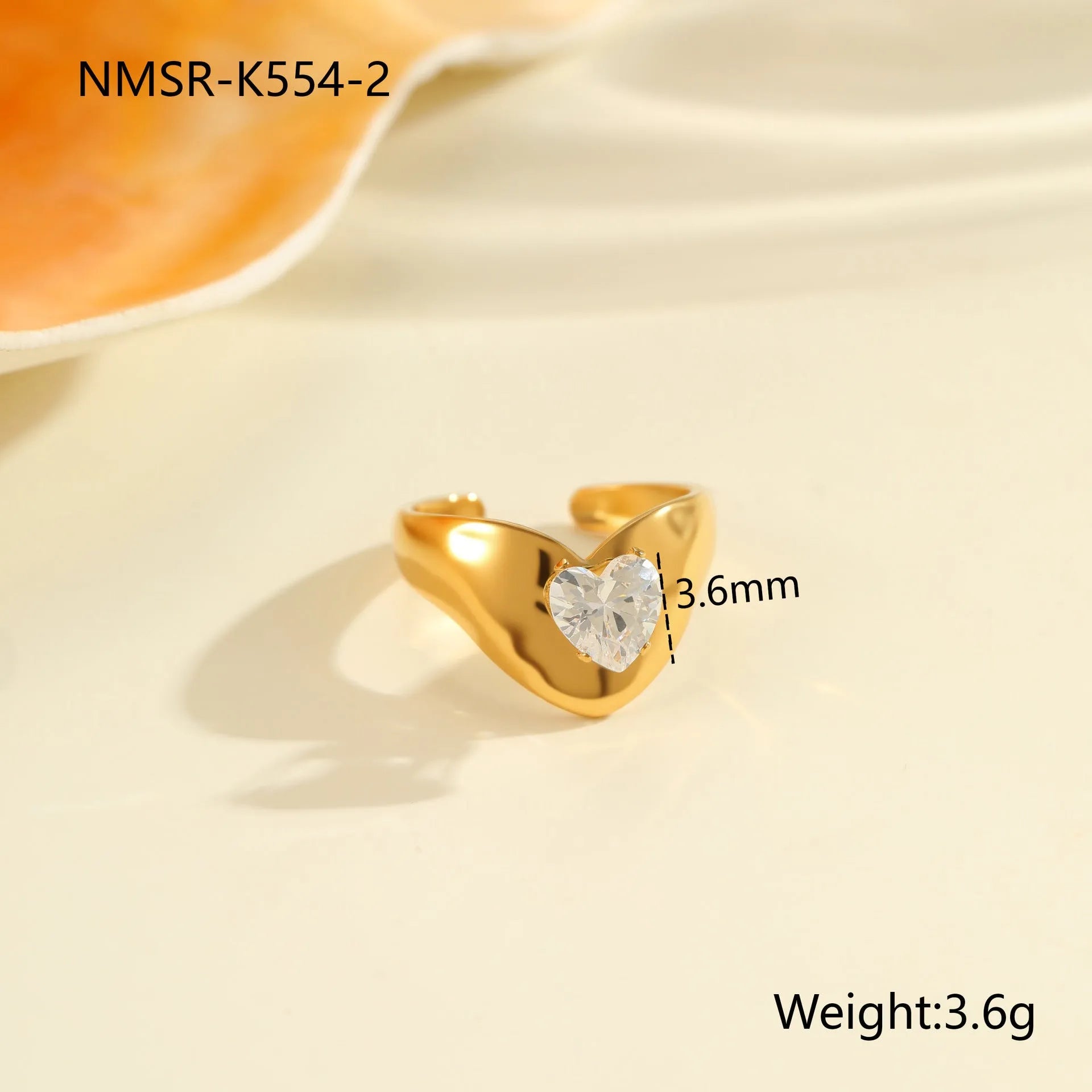 Geometric stainless steel ring with open mouth adjustable design and faceted zircon centrepiece