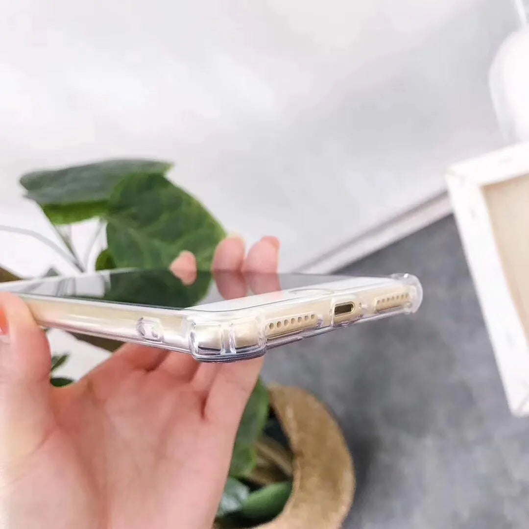 TPU mirror phone case for iPhone on a table, showing anti-fingerprint finish.