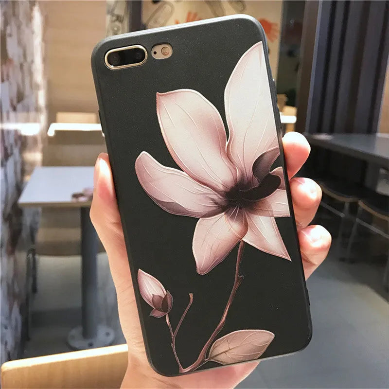 Embossed floral TPU iPhone case in black and white showing raised flower pattern design