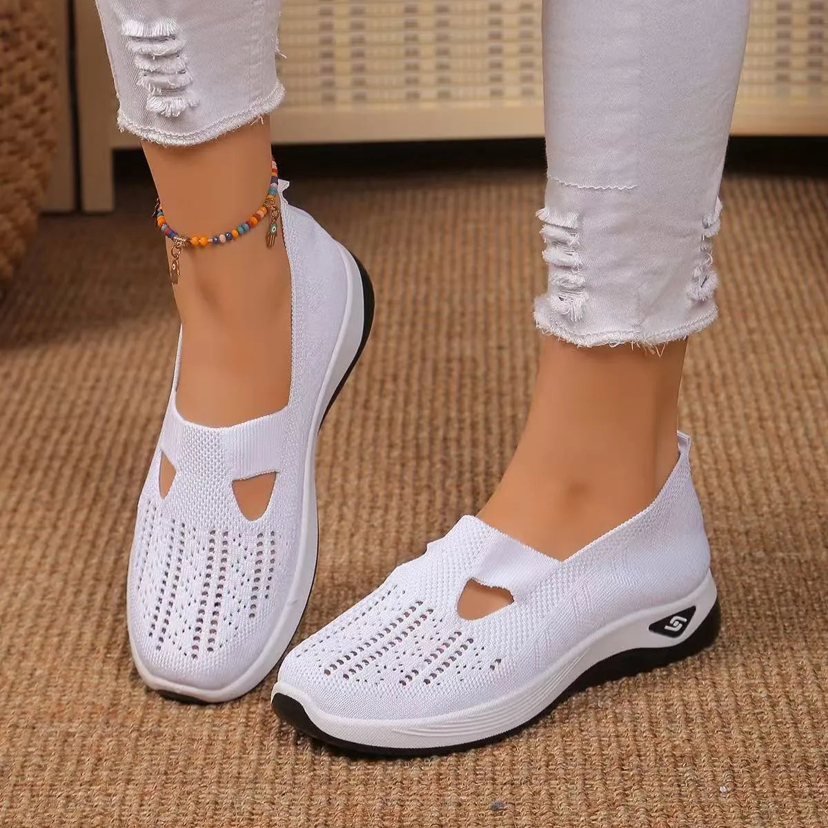 Casual mesh walking shoes with T-strap in multiple colours on a soft PVC sole.