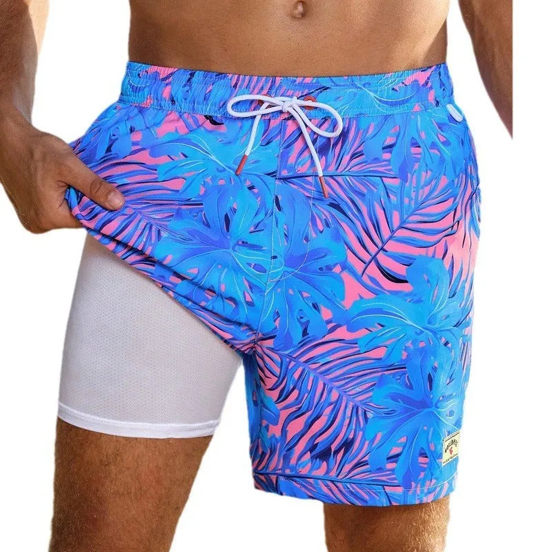 Men's loose fit quick-drying swimming trunks in a floral print design.