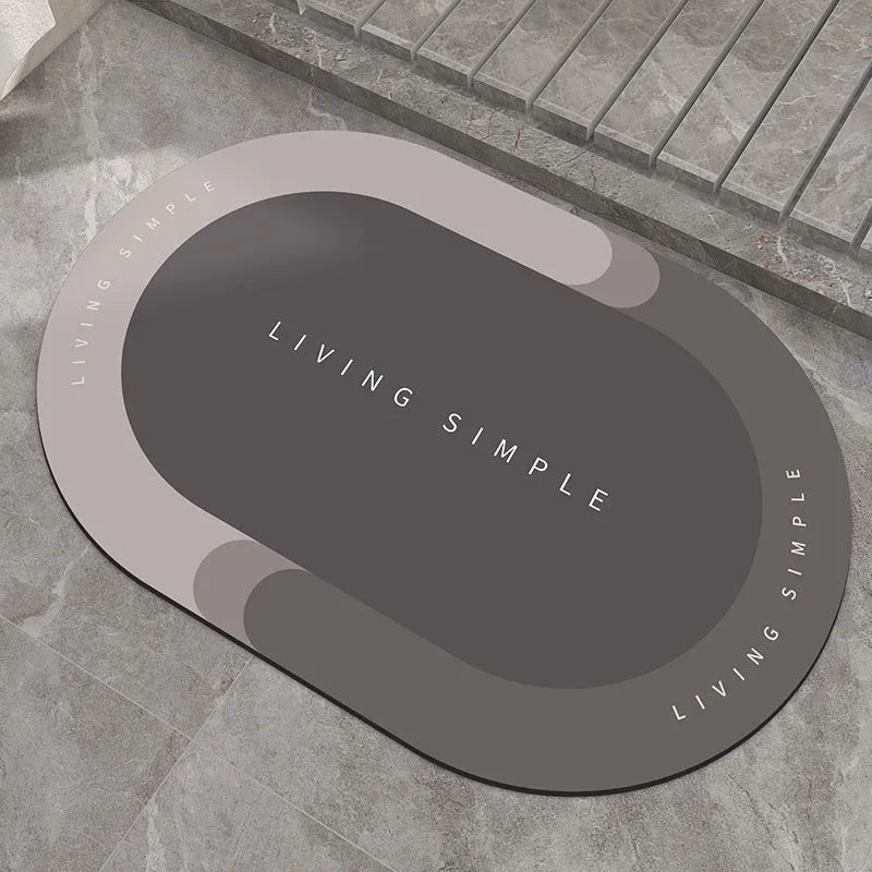 Super absorbent oval bath mat in grey with non-slip rubber bottom, 40x60cm