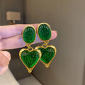 Silver pleated oval love heart stud earrings in purple, red, green, and yellow white colours.