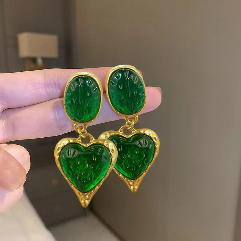 Silver pleated oval love heart stud earrings in purple, red, green, and yellow white colours.