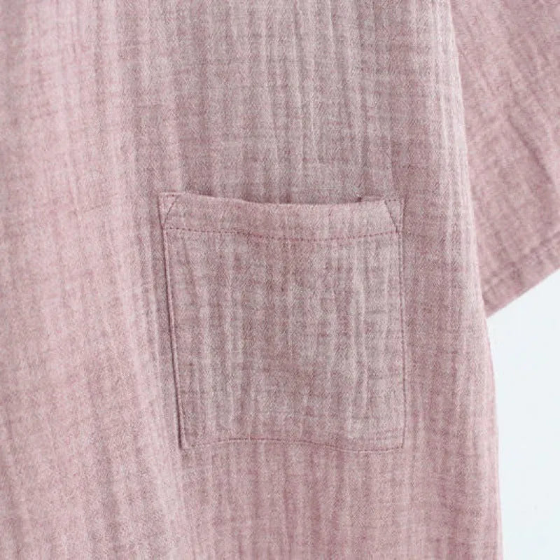 Men's cotton gauze kimono bathrobe in grey washed cotton with a traditional wrap-front design, shown on a hanger.