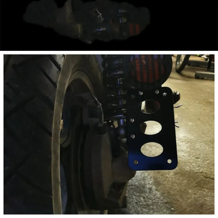 Black aluminium motorcycle side direction taillight and 7 x 4 inch licence plate bracket with seven-fin 12V light.